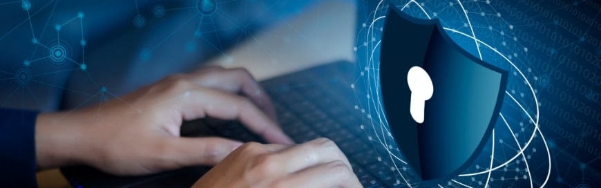 person typing on laptop with security shield icon above keyboard cybersecurity support